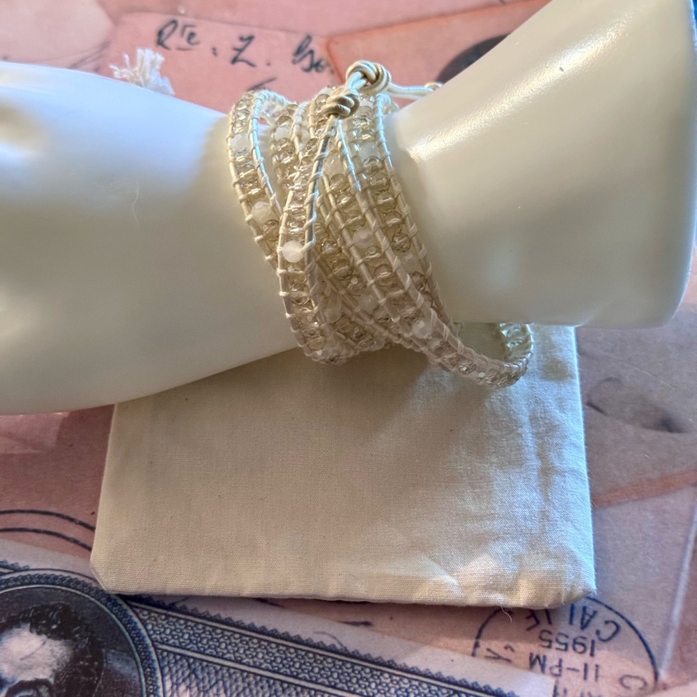 #1 💕White Crystals spaced out against faded peach tones crystal bracelet.